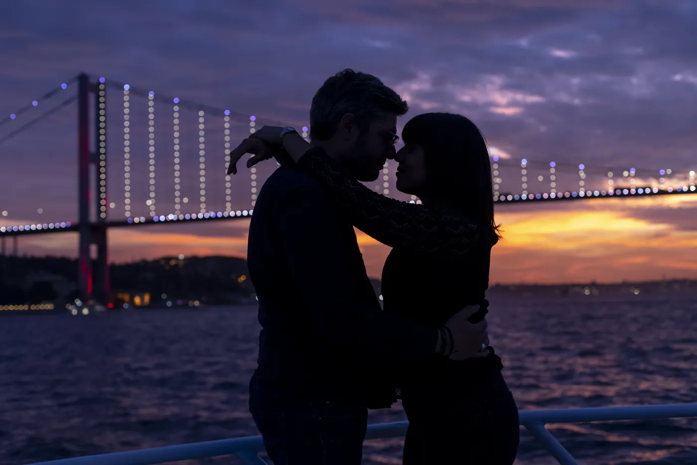 Couple on a luxury Bosphorus cruise at night