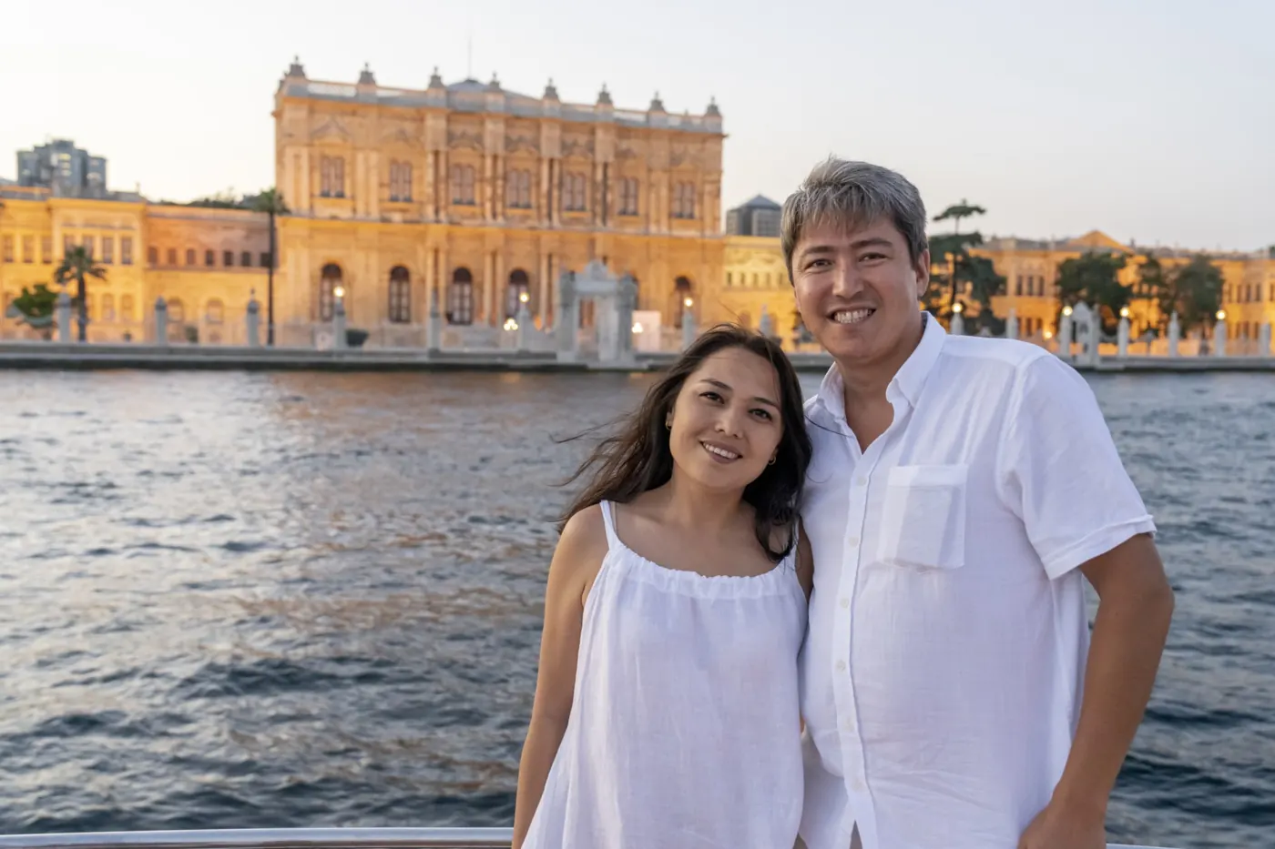 Couple in front of Dolmabahçe Palace on a private Bosphorus cruise