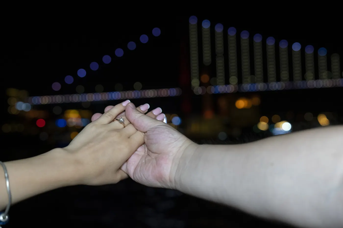 Engagement ring on a Bosphorus yacht at night